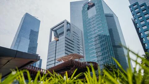 Bottom view, a tall and rectangular office building looks minimalist Stock Photos