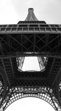Bottom View of the tall Eiffel Tower in Paris with black and white effect Fotos de archivo