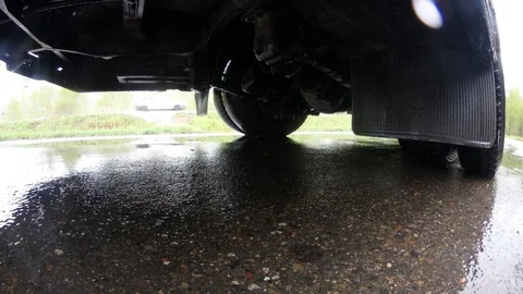 The bottom view through the wheel of the car Video stock 120936503