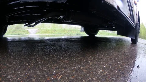 The bottom view through the wheel of the car Stock Footage 121050225