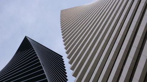 Bottom view. Two modern office buildings against the sky. Stock Footage 234506432