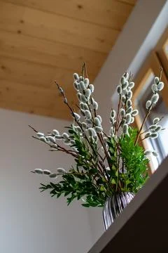 Bottom view of a vase filled with willow and boxwood Stock Photos
