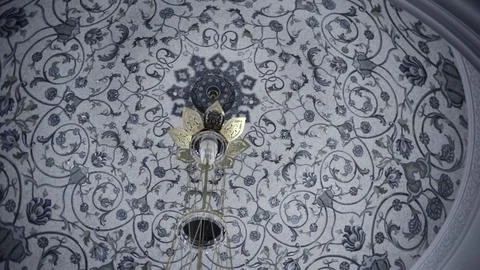 Bottom view of the white ceiling with blue ornamental pattern. Scene. Hanging Stock Photos