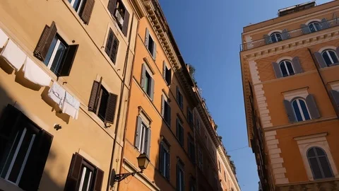 Bottom view with wide angle of ancient stately buildings in the center of rom Stock Footage 124976726
