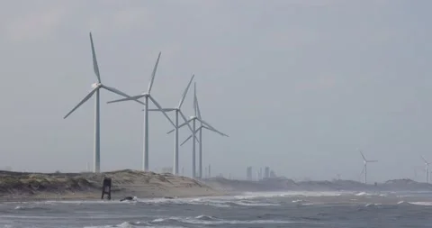 Bottom view of wind turbine over the seaside Stock Footage 239439102