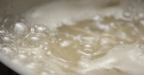 Bouillon water boiling cooking slowmotion Stock Footage 103493328