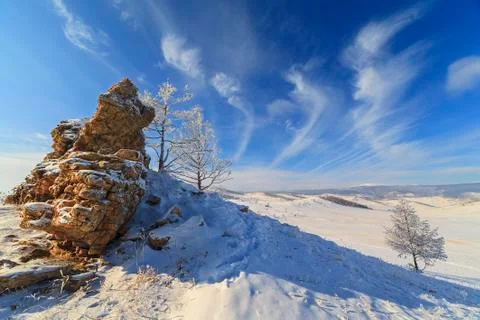 Boulder against the sky in winter Foto stock