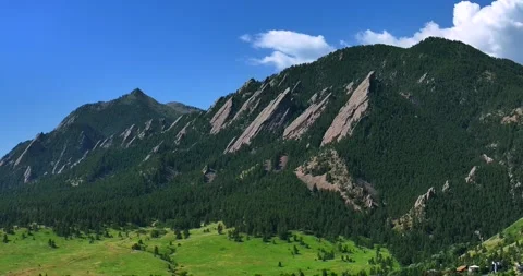 Boulder Colorado Flatirons slanted Front Range Rocky Mountains aerial drone Stock Footage 316573697
