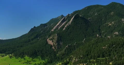 Boulder Colorado Flatirons slanted Front Range Rocky Mountains aerial drone Stock Footage 316574068