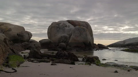 Boulder, Sand, and Ocean Stock Footage 229427498