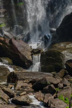 Boulder in upper whitewater falls 写真素材