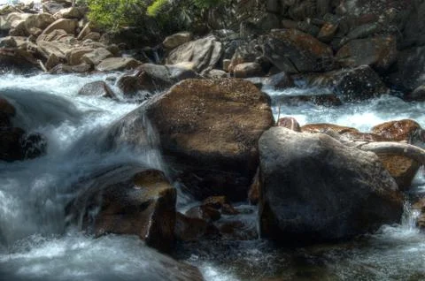 Boulders in the stream Stock Photos