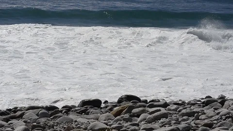Boulders in surf Stock Footage 103985099