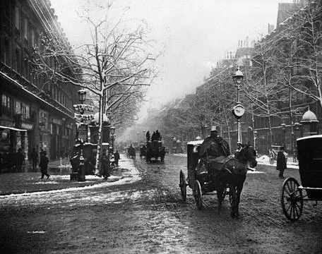 The Boulevard des Capucines under The Boulevard des Capucines under the sn... Stock Photos