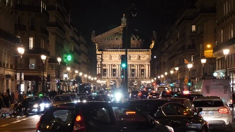 Boulevard at Paris Opera At Night - Moving Traffic Stock Footage 100889129