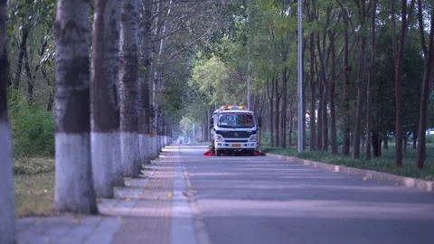 On the boulevard, the sweeper is coming. Stock Footage 125374222