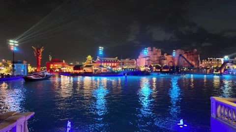 Boulevard World in Riyadh night view with buildings, vintage car, and boats Vídeos de archivo 306288883