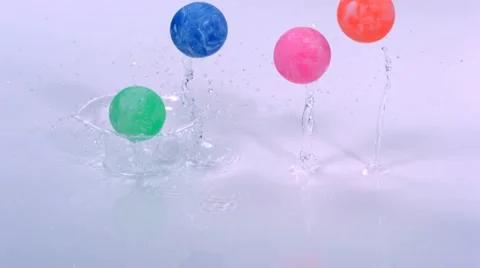 Bounce ball in water, Slow Motion Stock Footage
