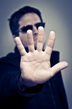 A bouncer rejecting entry Stock Photos