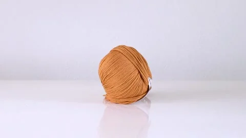 Bouncing ball of yarn orange Stock Footage 145069632