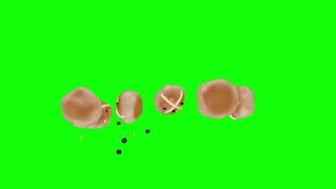 Bouncing hot cross buns - looping 3d animation on green. Stock Footage 87022033
