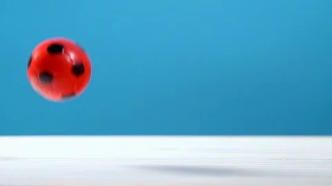 Bouncing red and black soccer ball Video stock 130012828