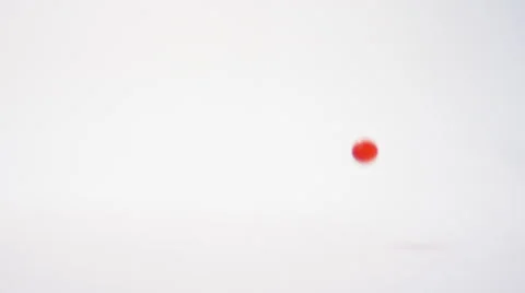 Bouncing Red Balls Slow Motion 4K Stock Footage 60957083