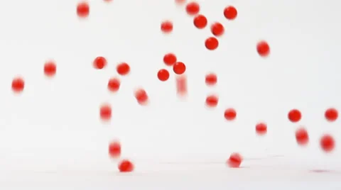 Bouncing Red Balls Slow Motion 4K Stock Footage 60957084