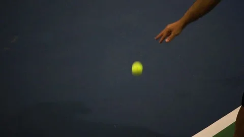 Bouncing the tennis ball and getting ready for serve, by01 Stock Footage 104663347