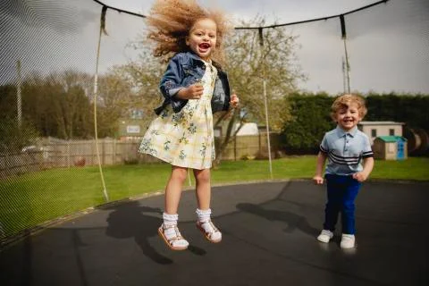 Bouncing on the Trampoline Fotos Stock