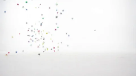 BOUNCY BALLS ON WHITE BACKGROUND Stock Footage 75730841