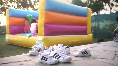 Bouncy Castle In A Playground Stock Footage 155752393
