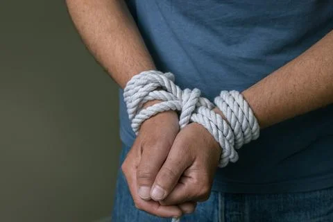 Bound Hands With Rope Captivity Concept. Stock Photos