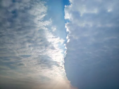 Boundary of atmospheric fronts. The sharp boundary of the clouds in the sky. Stock Photos