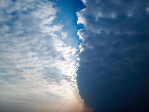 Boundary of atmospheric fronts. The sharp boundary of the clouds in the sky. Stock Photos