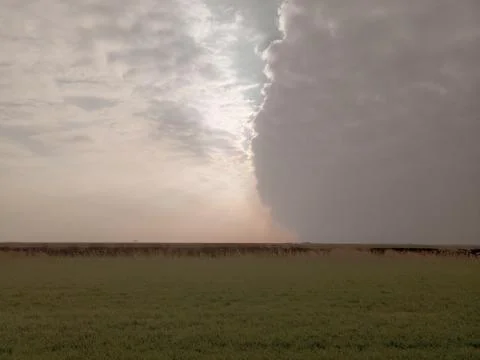 Boundary of atmospheric fronts. The sharp boundary of the clouds in the sky. Stock Photos