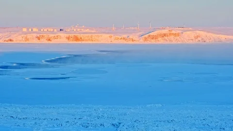 Boundless arctic desert covered with snow layer at sunset Stock Footage 124630012