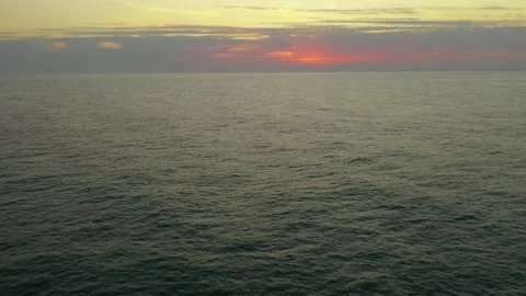 Boundless sea with small waves under cloudy evening sky Stock Footage 150828291