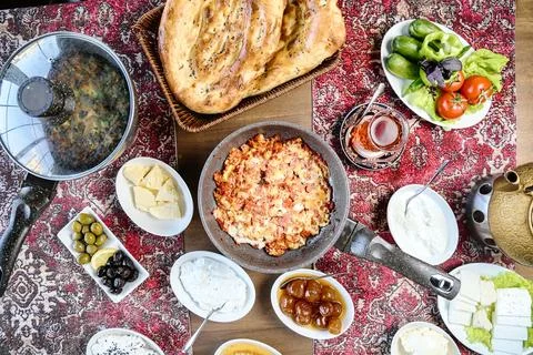 Bountiful Array of Food Drinks on Table for Festive Gathering Stock Photos