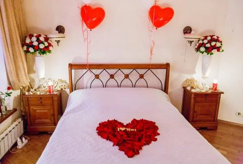 Bouquet on the bed Stock Photos