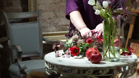 A bouquet is being made on the table Stock Footage 163566702