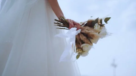 Bouquet in the bride's hand Stock Footage 163971507