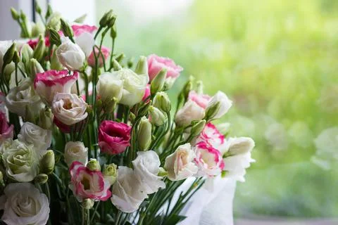 Bouquet from colored flowers of eustoma Stock Photos