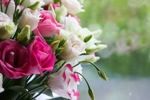 Bouquet from colored flowers of eustoma Stock Photos