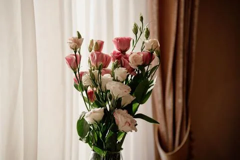 Bouquet of colored flowers on the table Stock Photos
