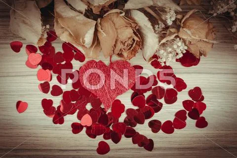 Bouquet of dried roses and red box, valentine Stock Photos
