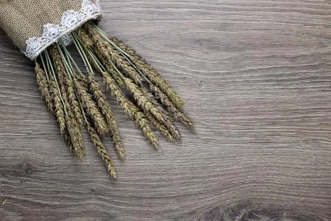 Bouquet of ears of rye on canvas Stock Photos