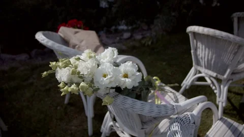 A bouquet of eustoma flowers on a chair. Stock Footage 166703865