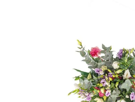 Bouquet of eustomess and eucalyptus on a white background Stock Photos
