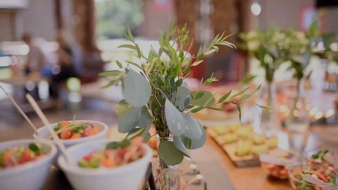 Bouquet of flowers and buffet table at the Banquet Stock Footage 119600091